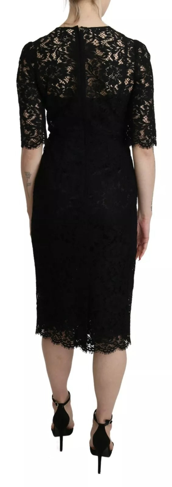 Robe noire en dentelle florale Dolce & Gabbana, coupe ajustée, longueur genou, élégante et sophistiquée.