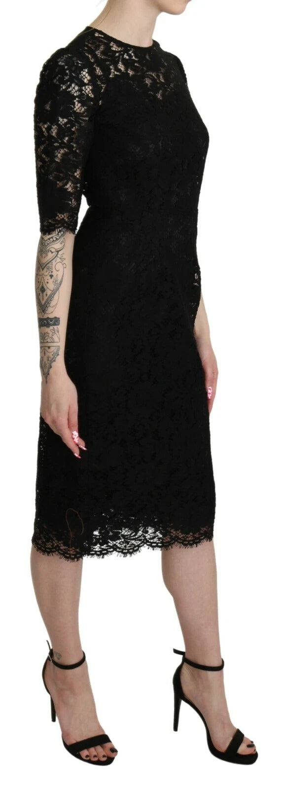 Robe noire en dentelle florale Dolce & Gabbana, robe droite longueur genou, élégante et sophistiquée.
