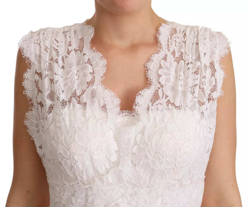 Robe longue maxi blanche Dolce & Gabbana avec corsage en dentelle à motifs floraux élégants.