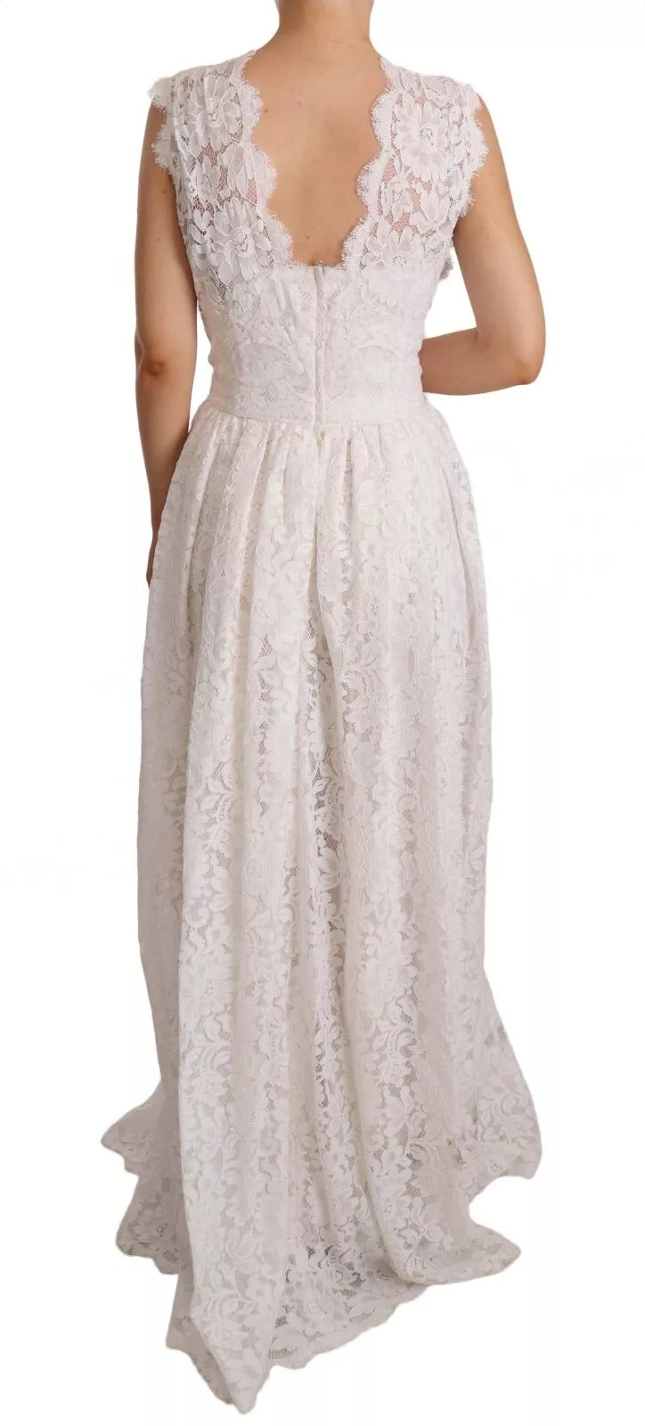 Robe longue maxi blanche Dolce & Gabbana avec corsage en dentelle florale, élégante et sophistiquée, détails fleuris visibles.
