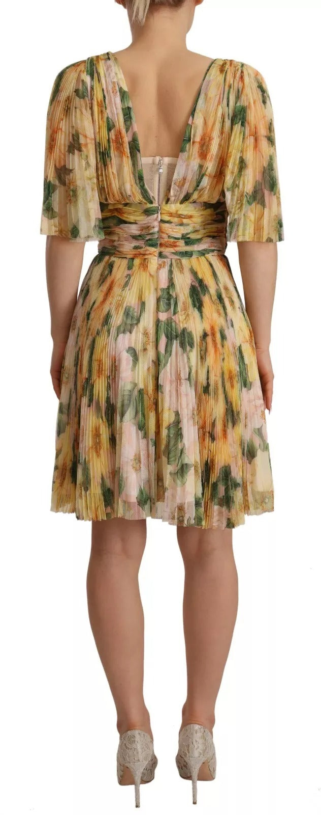 Robe longue plissée à fleurs jaunes de Dolce & Gabbana, style floral print et élégance maxi.