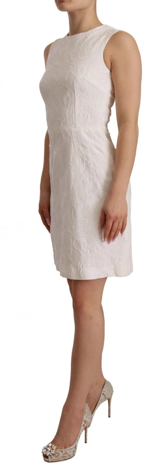 Robe courte blanche sans manches Dolce & Gabbana avec motif floral, coupe ajustée et élégante pour femme.