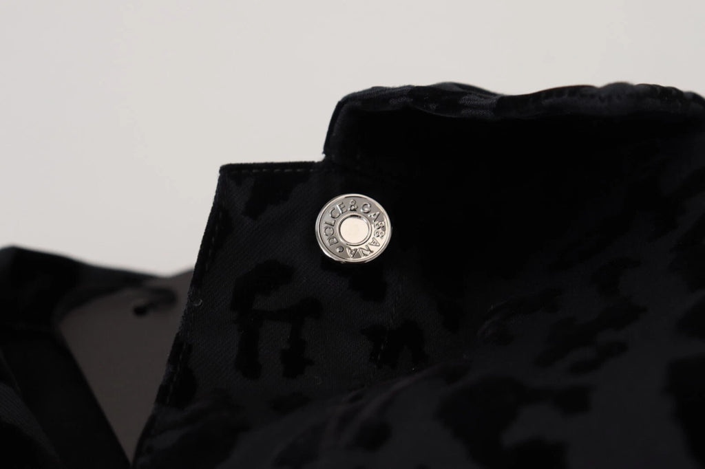 Veste en denim noire à manches longues avec motif léopard en coton Dolce & Gabbana, style élégant et tendance.