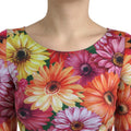 Robe courte Dolce & Gabbana à imprimé floral multicolore, style robe-tube élégante avec détails colorés.