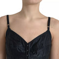 Robe mini noire en nylon avec corset ajusté de Dolce & Gabbana, silhouette moulante et détails sophistiqués.