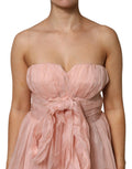 Robe midi en soie rose en chiffon plissé de style A-line de Dolce & Gabbana, élégante et fluide.
