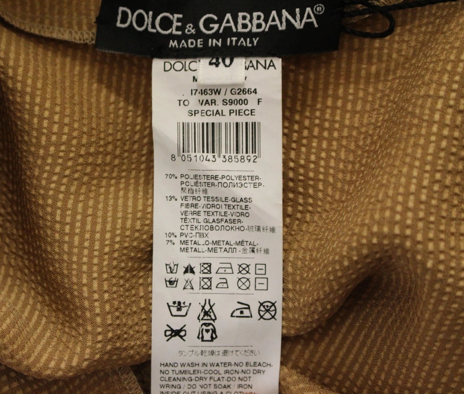 Blouse Dolce & Gabbana en cristal doré, pièce unique de la collection runway, élégante et sophistiquée.