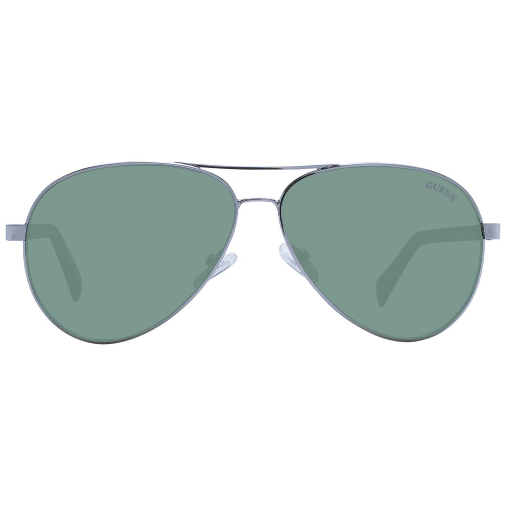 Lunettes de soleil en métal gris Guess avec monture élégante et branches fines, idéales pour un look tendance et sophistiqué.