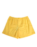 Short de bain en coton jaune Dolce & Gabbana avec taille élastique, idéal pour la plage ou la piscine.