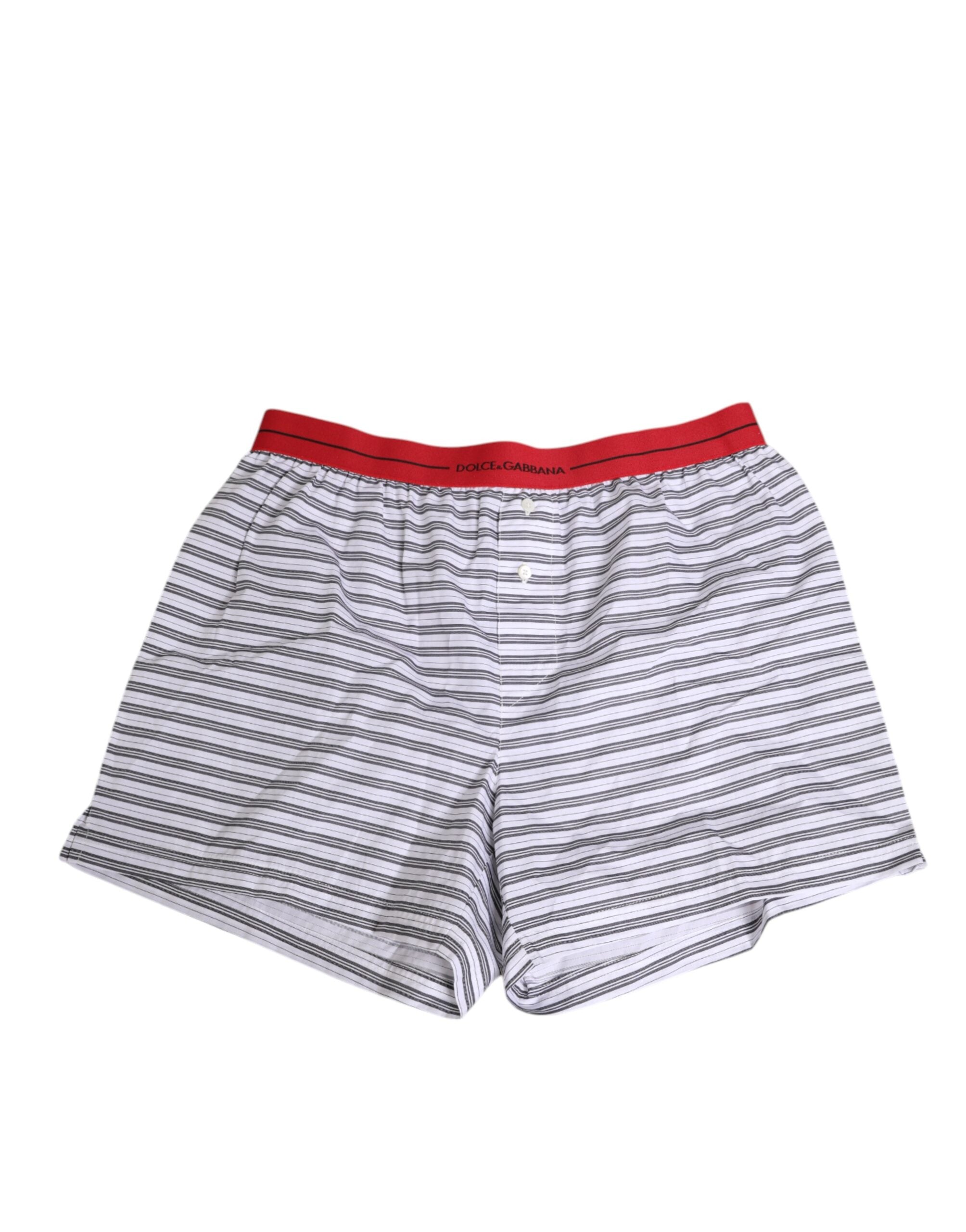 Shorts de bain Dolce & Gabbana à rayures blanches, coton avec ceinture rouge, style décontracté et élégant.