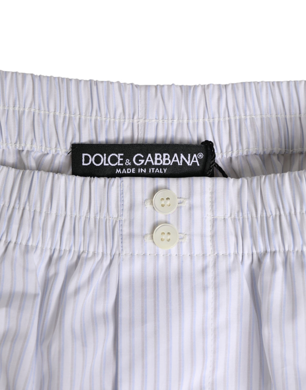 Shorts de bain Dolce & Gabbana en coton blanc et bleu à rayures avec bouton, style décontracté et élégant.