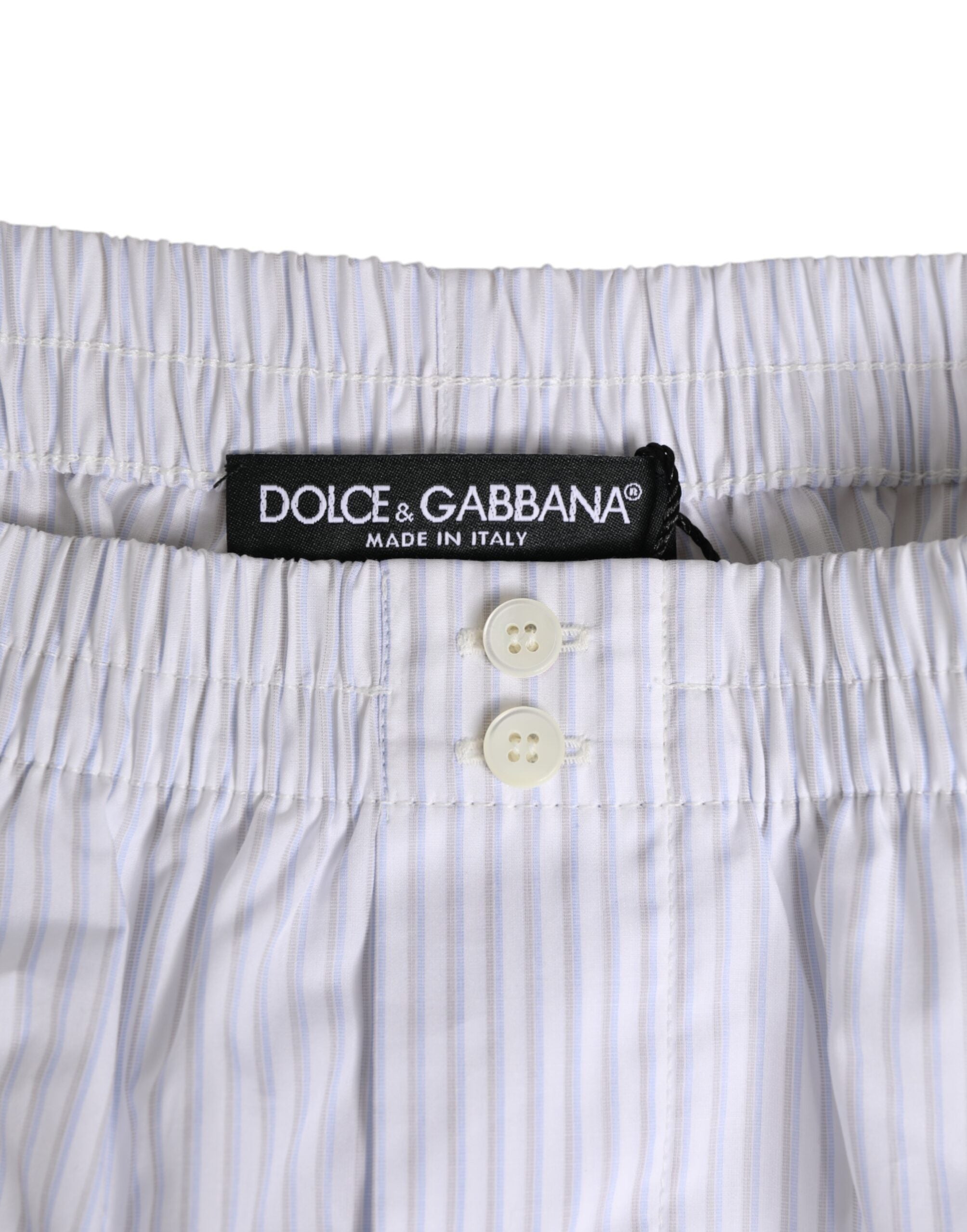Shorts de bain Dolce & Gabbana en coton blanc et bleu à rayures avec bouton, style décontracté et élégant.