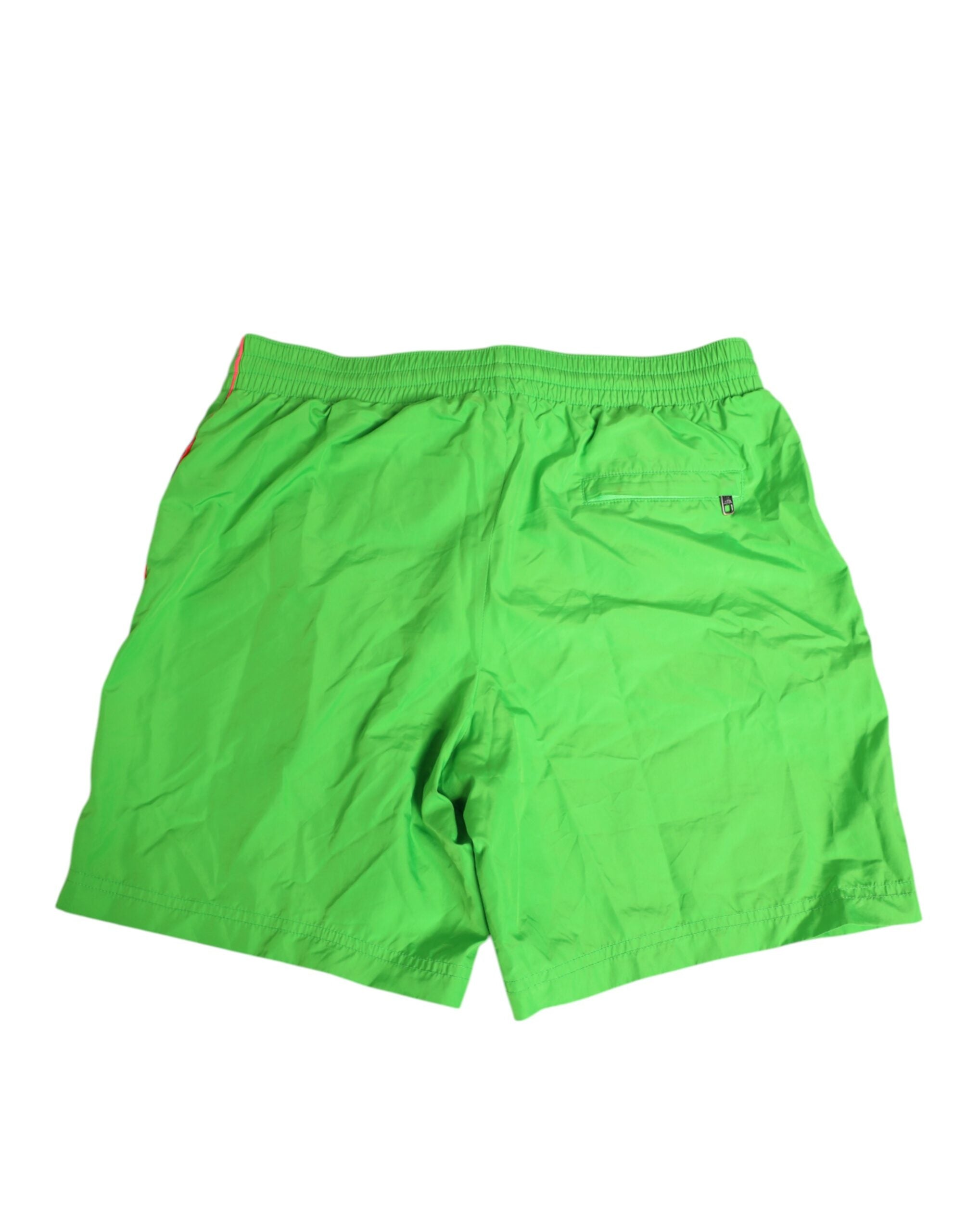 Shorts de bain homme en nylon vert Dolce & Gabbana avec cordon de serrage, style sportif et élégant.