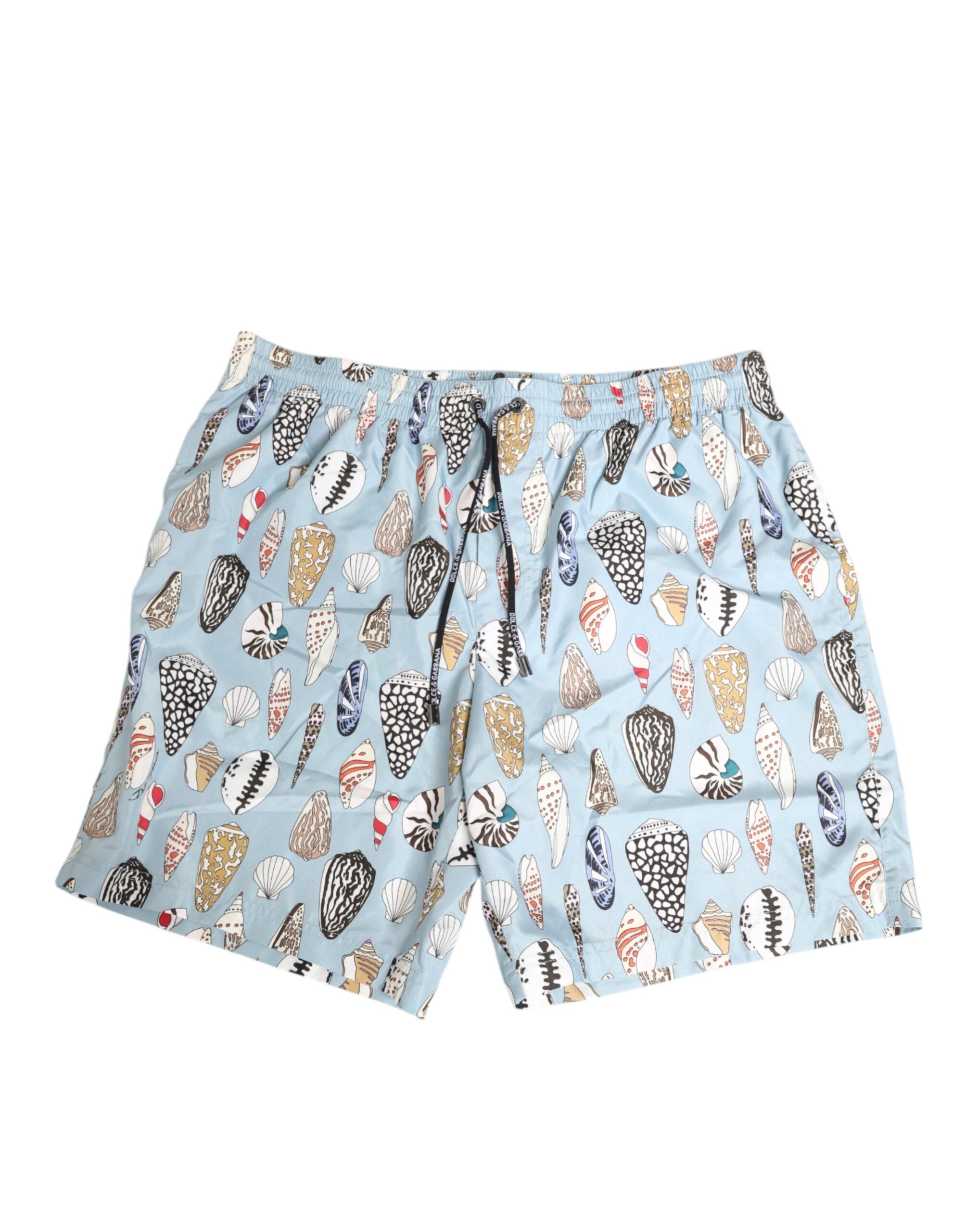 Shorts de bain en nylon Dolce & Gabbana avec motif coquillage bleu, style homme, vêtement de plage élégant.