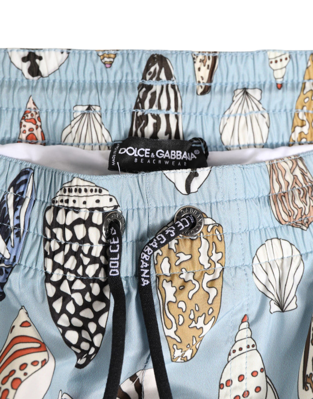 Shorts de bain en nylon Dolce & Gabbana avec motif de coquillages bleus, parfait pour la plage et la natation.