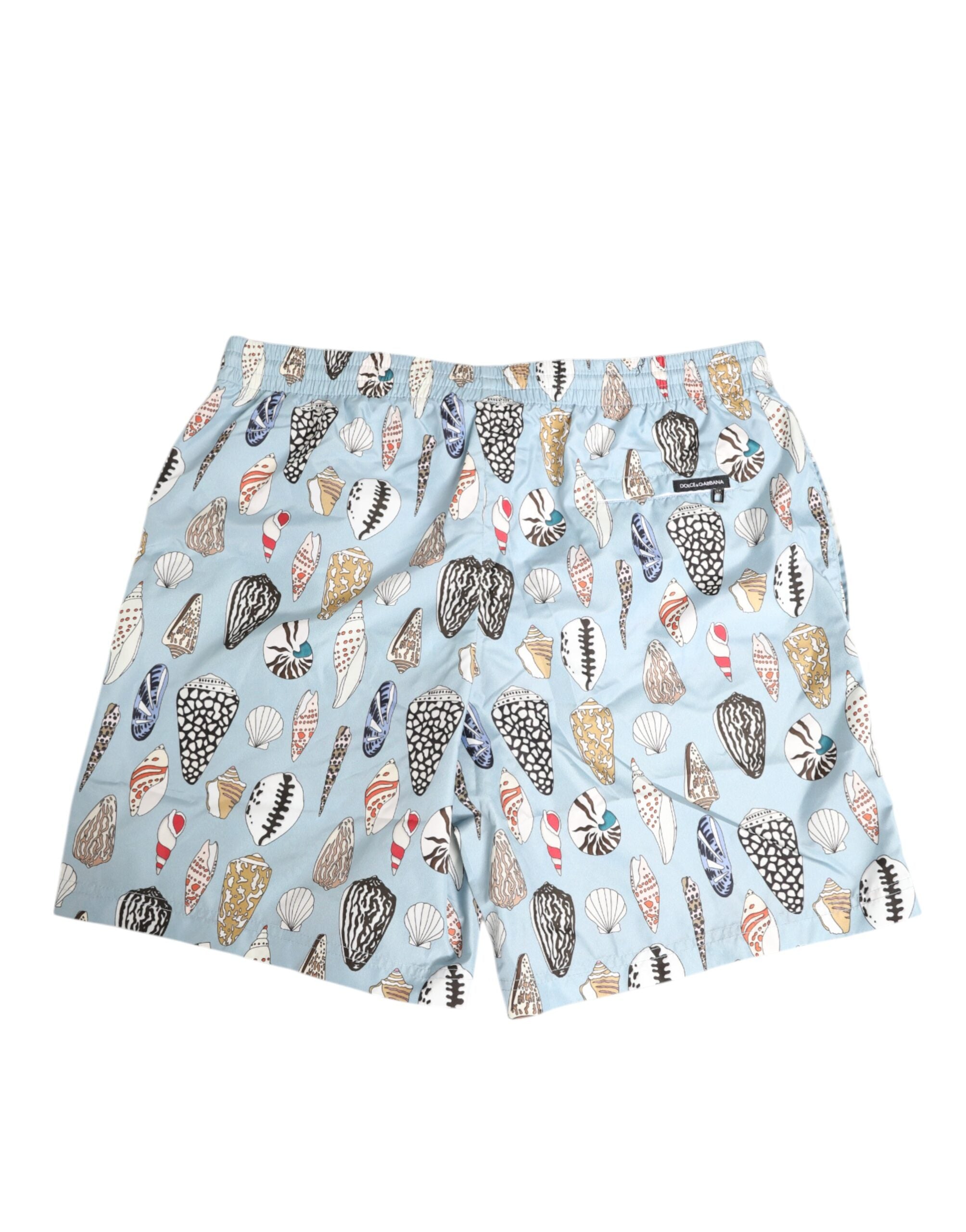 Shorts de bain en nylon Dolce & Gabbana avec motif coquillage bleu, style plage et détente, pour hommes.