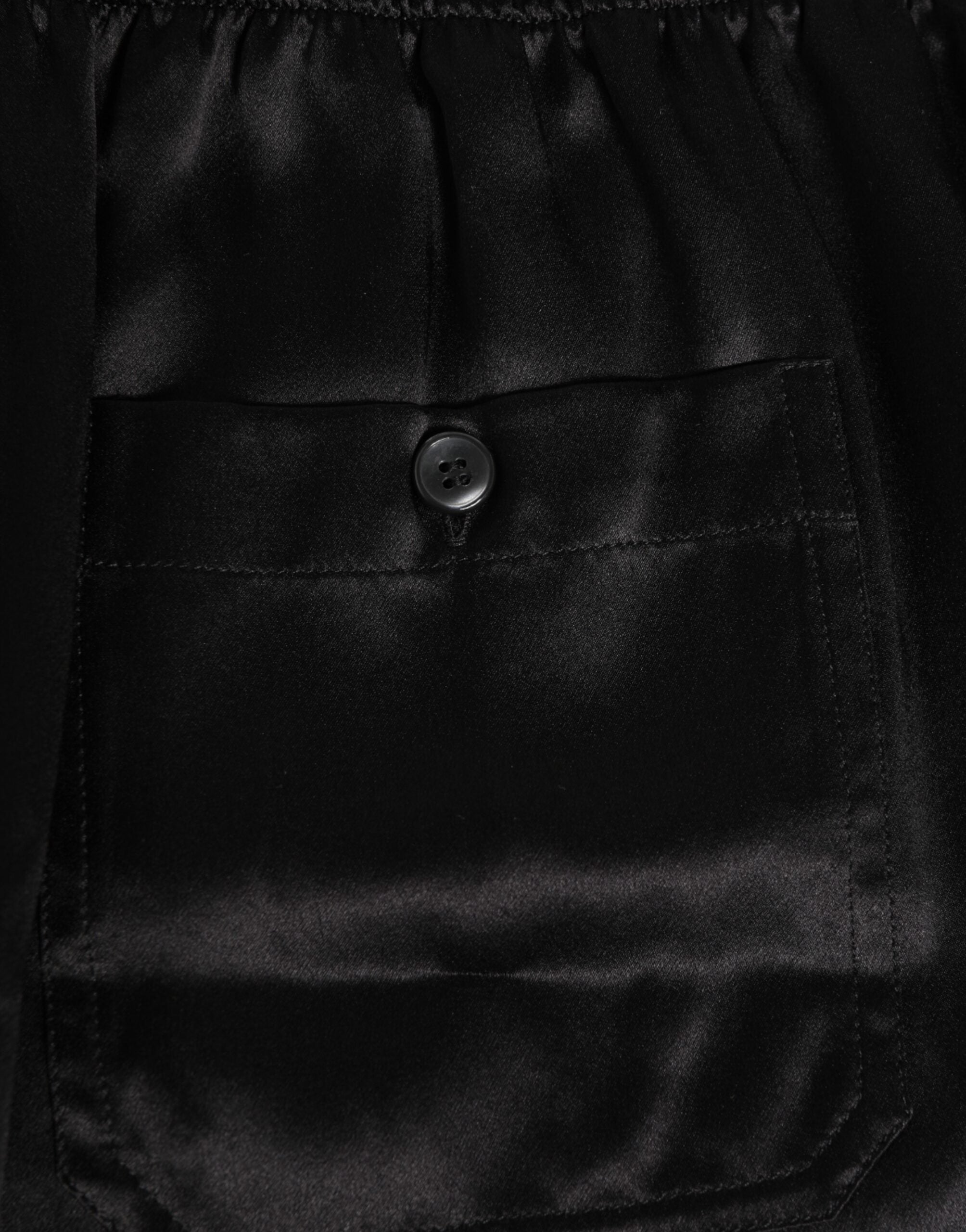 Boxers de bain pour hommes en satin de soie noir de Dolce & Gabbana, avec élastique, confort et style élégant.
