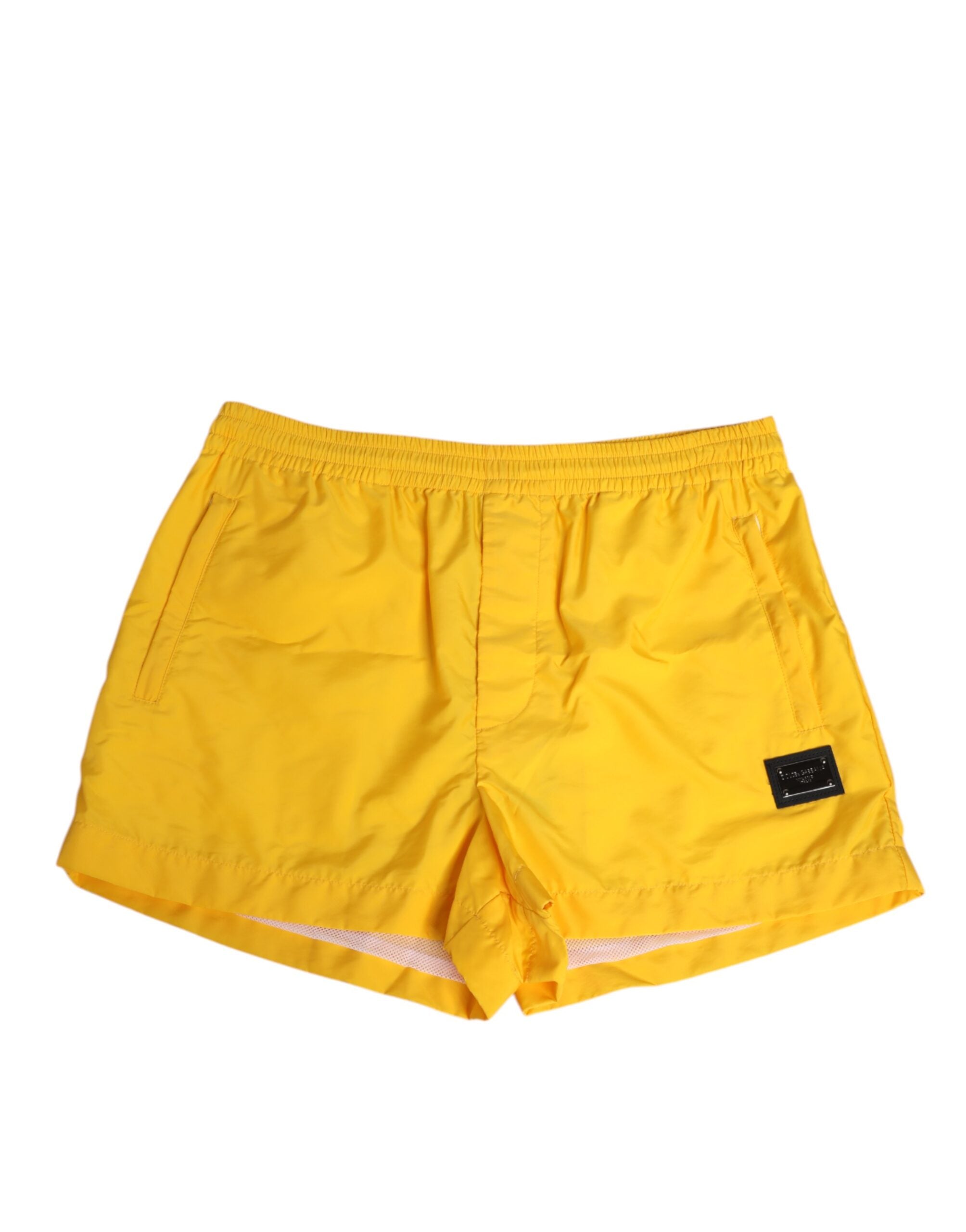 Boxers de bain en nylon jaune Dolce & Gabbana avec logo et plaque, vêtements de plage élégants et confortables.