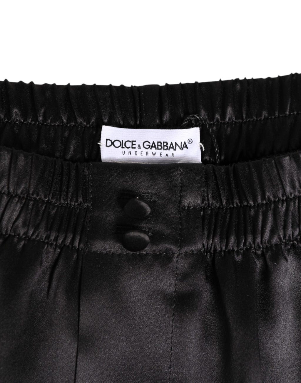 Boxers de bain noirs en satin de soie élastique Dolce & Gabbana pour homme, avec un design élégant et confortable.