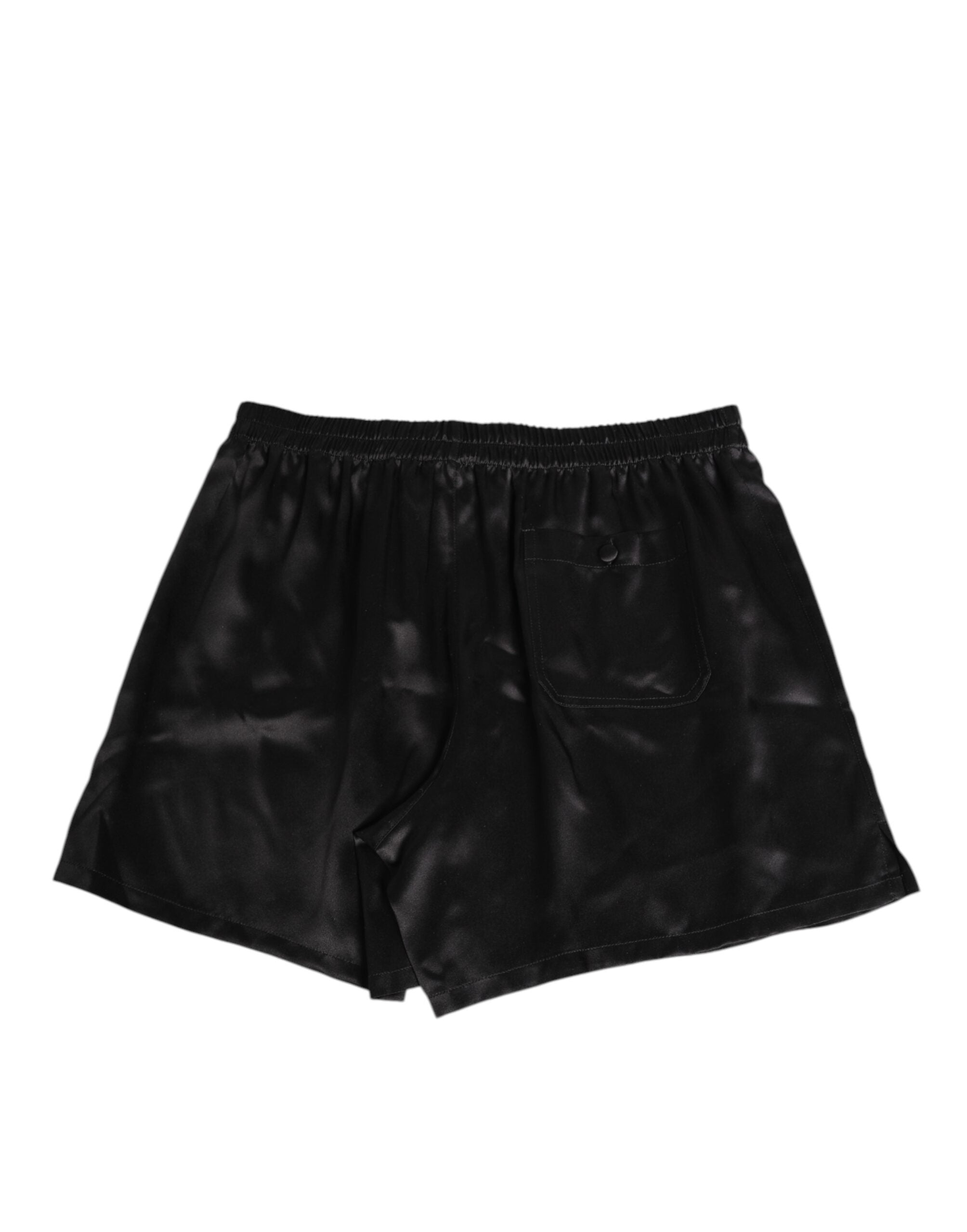 Shorts de bain homme en satin de soie noir de Dolce & Gabbana, boxer élastique et élégant.
