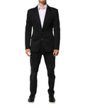 Veste pour homme Dolce & Gabbana en coton bleu foncé, style blazer ou manteau élégant avec fermeture et poche visible.