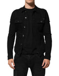 Veste en jean noir en coton stretch de Dolce & Gabbana, boutonnière, coupe ajustée, visible sur le mannequin.