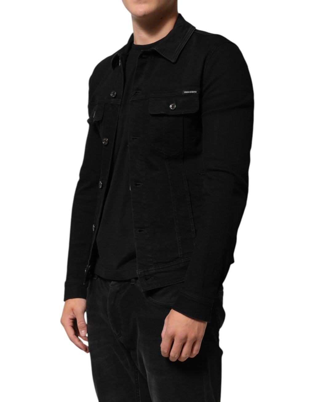 Veste en jean en coton noir Dolce & Gabbana avec boutons, coupe ajustée et détails élégants, vue de face.