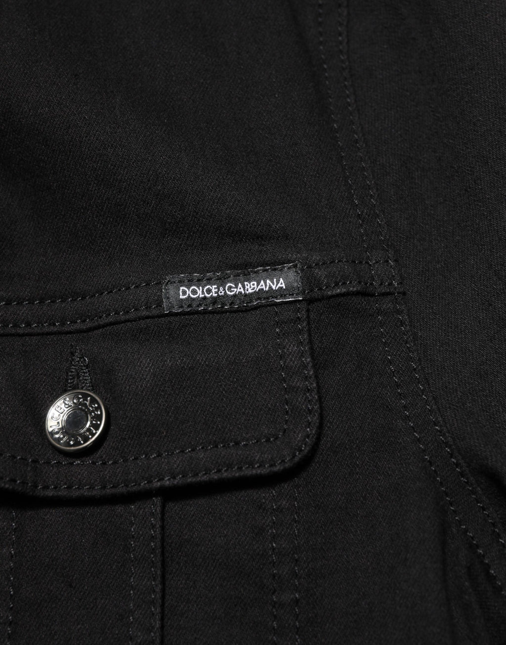 Veste en jean noir en coton extensible de Dolce & Gabbana, boutonnière, style décontracté et moderne.