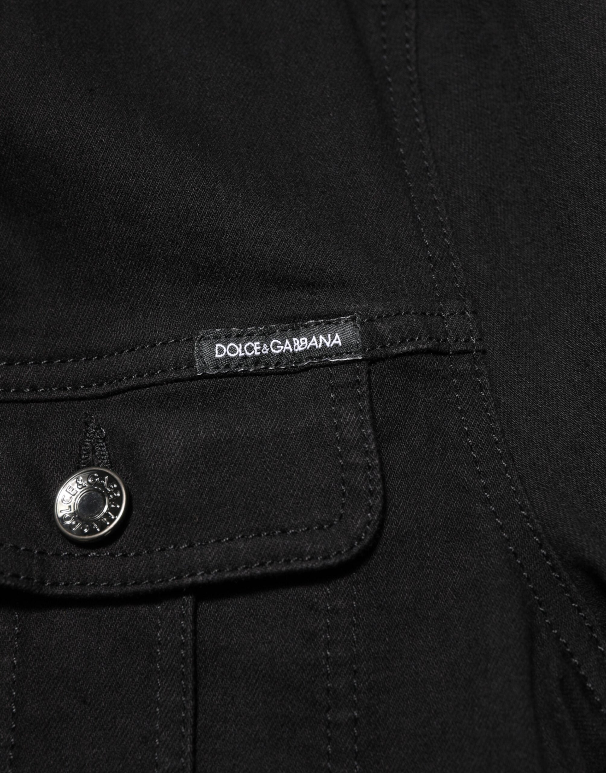 Veste en jean noir en coton extensible de Dolce & Gabbana, boutonnière, style décontracté et moderne.