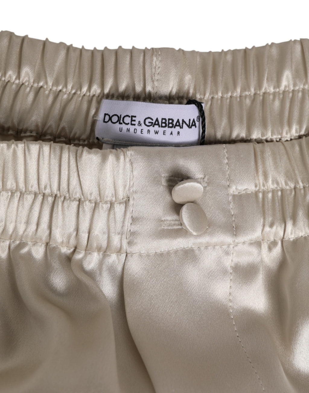 Boxers de bain pour homme Dolce & Gabbana en satin de soie beige, élastiques et élégants.