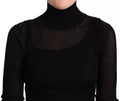 Pull à col roulé noir Dolce & Gabbana, ajusté et élégant, en laine douce, porté sur un modèle.