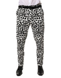 Pantalon en coton mélangé Dolce & Gabbana à motif abstrait noir et blanc, avec coupe élégante et design moderne.