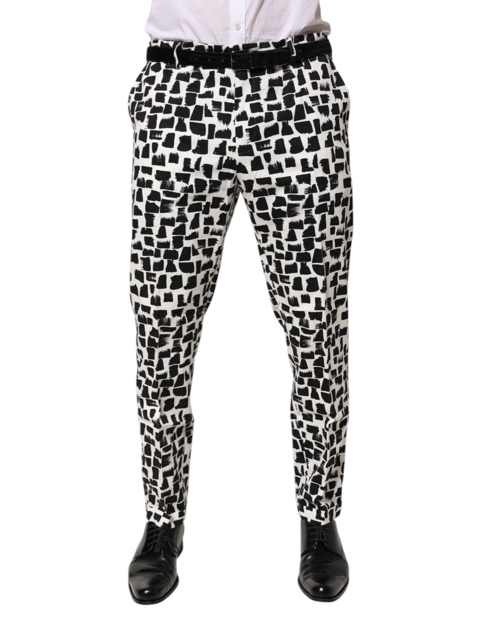 Pantalon en coton mélangé Dolce & Gabbana à motif abstrait noir et blanc, avec coupe élégante et design moderne.