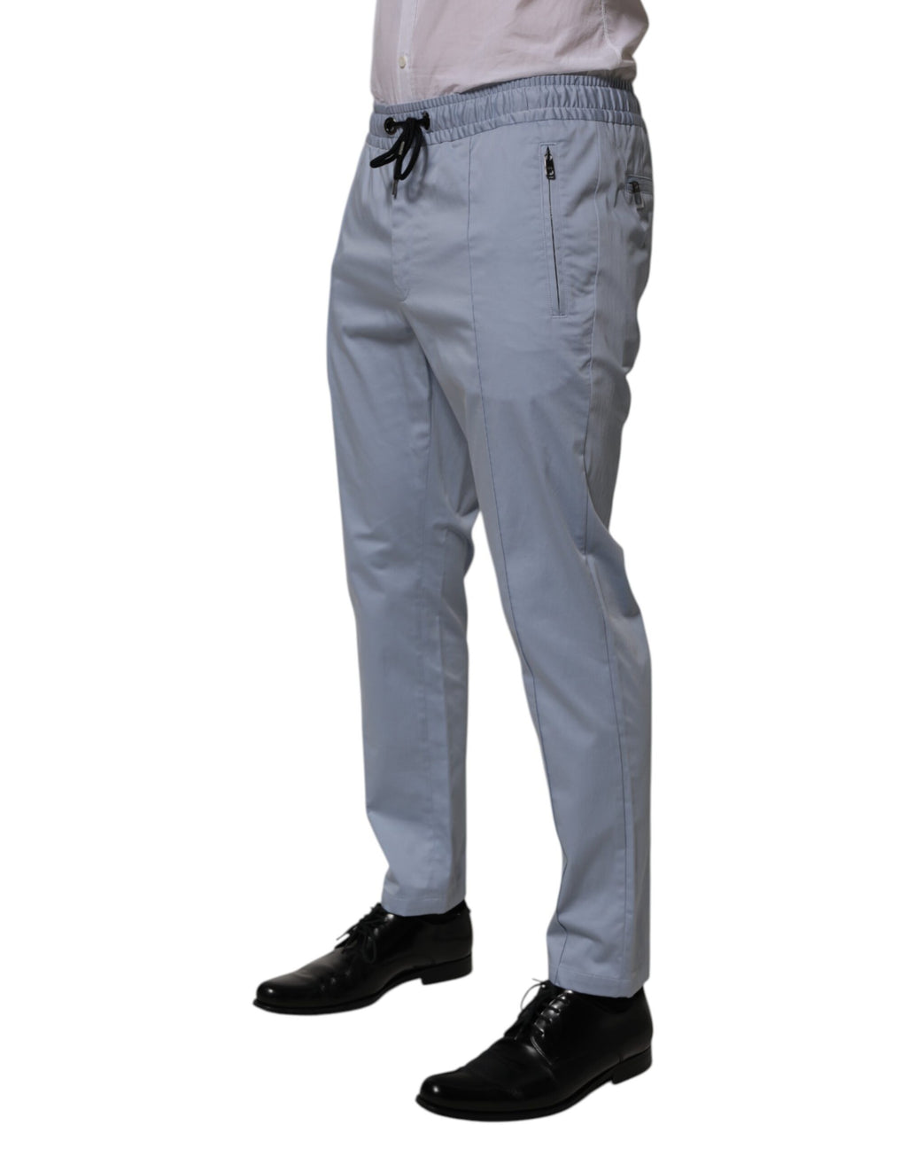 Pantalon homme Dolce & Gabbana Light Blue en coton avec taille élastique à cordon de serrage, style décontracté et confortable.