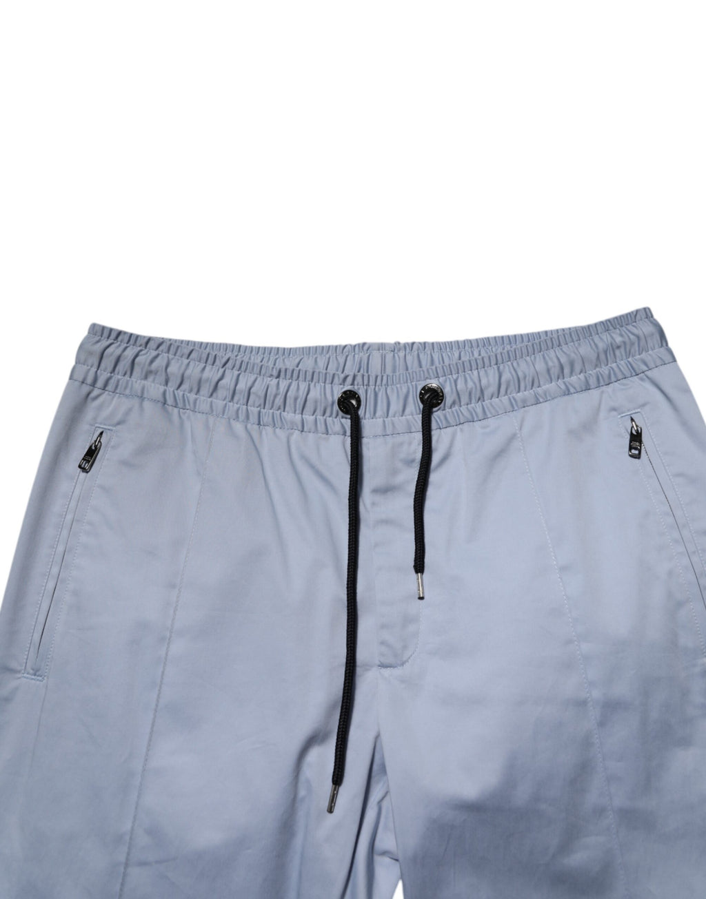 Pantalon homme Dolce & Gabbana Light Blue en coton avec taille élastique et cordon de serrage, vue de face.