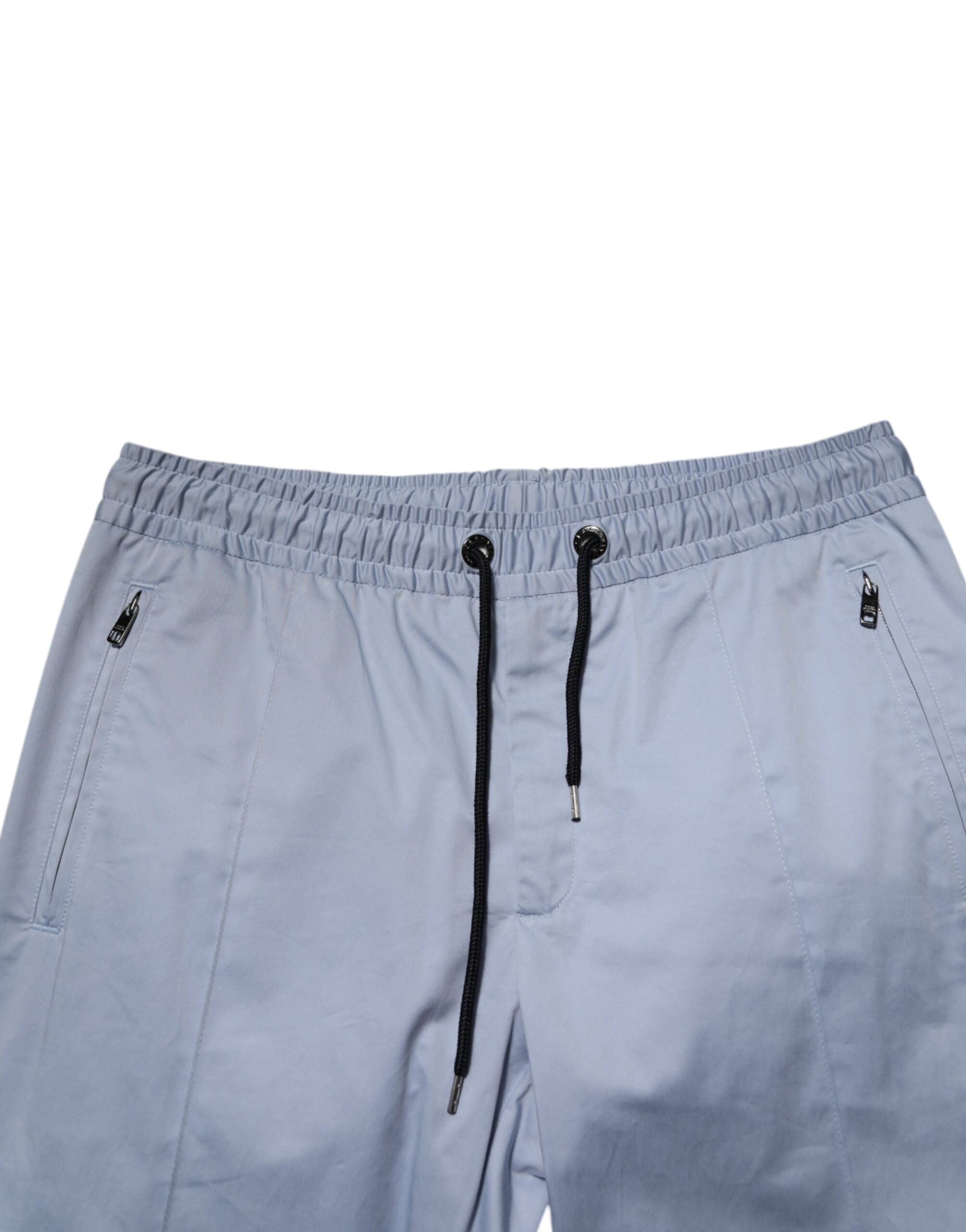 Pantalon homme Dolce & Gabbana Light Blue en coton avec taille élastique et cordon de serrage, vue de face.