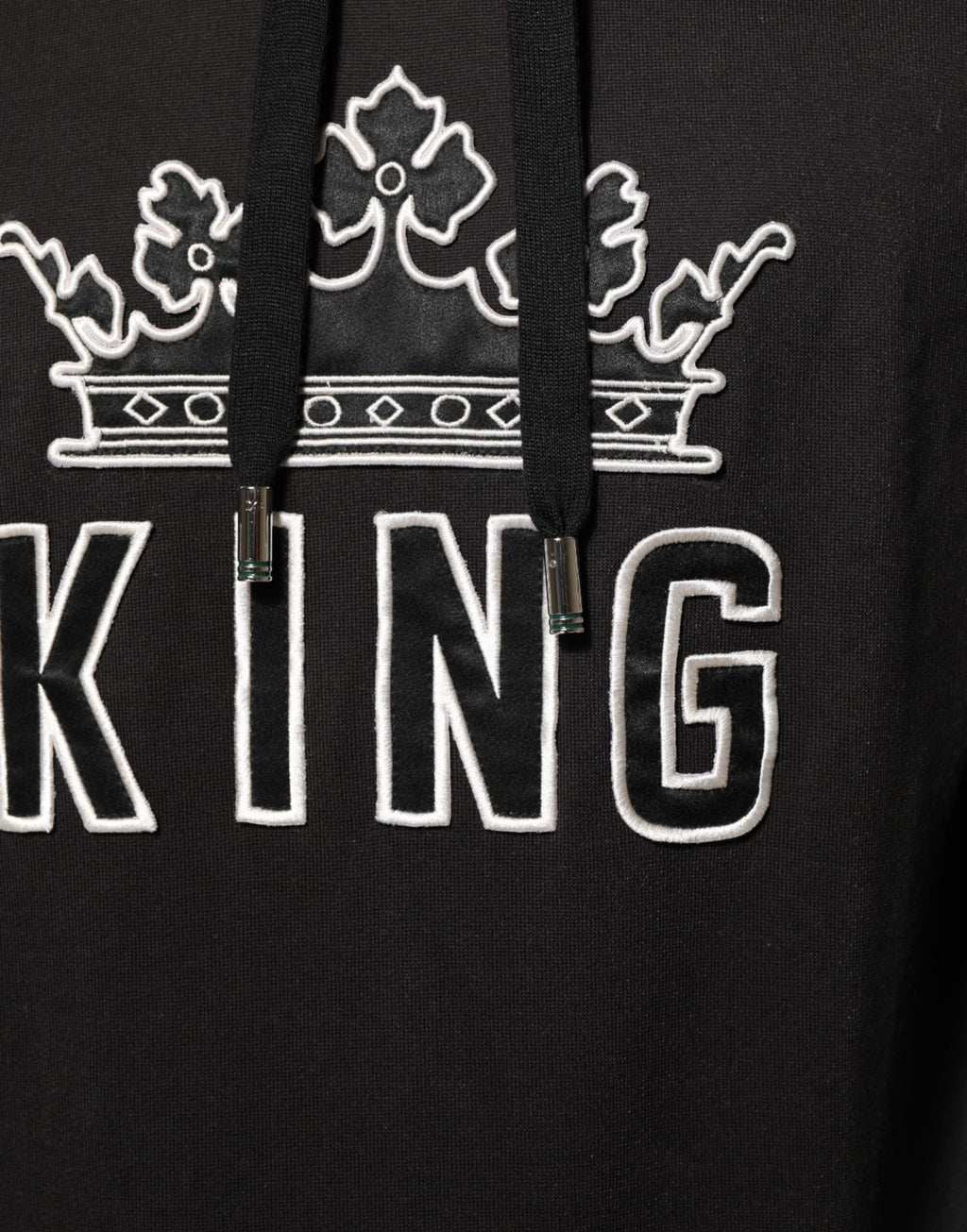 Sweat à capuche noir Dolce & Gabbana KING Black Orchid avec logo floral, vue de face avec détails du design.