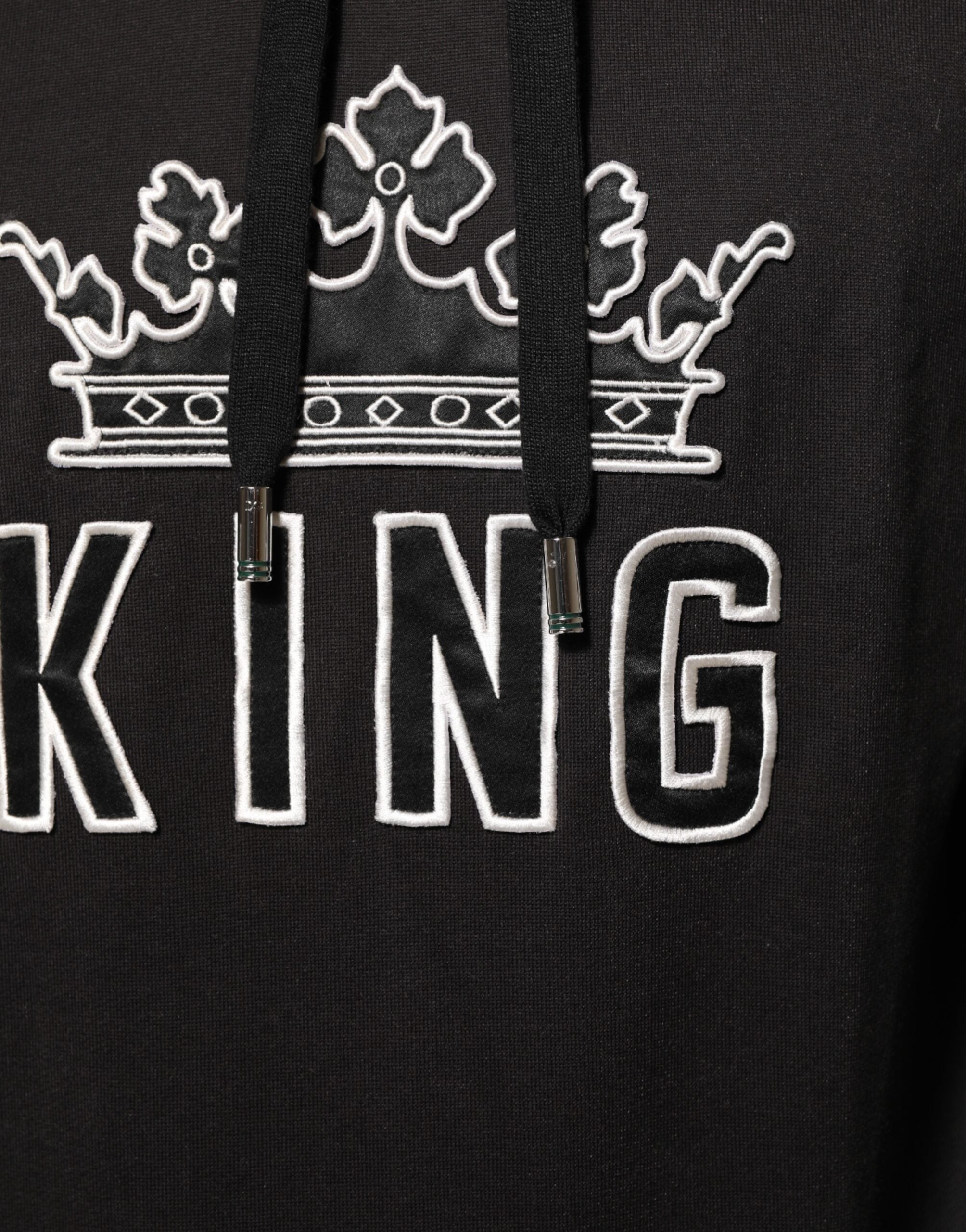 Sweat à capuche noir Dolce & Gabbana KING Black Orchid avec logo floral, vue de face avec détails du design.