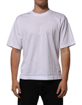 T-shirt homme Dolce & Gabbana en coton blanc avec logo brodé, col rond et patch de marque sur la poitrine.