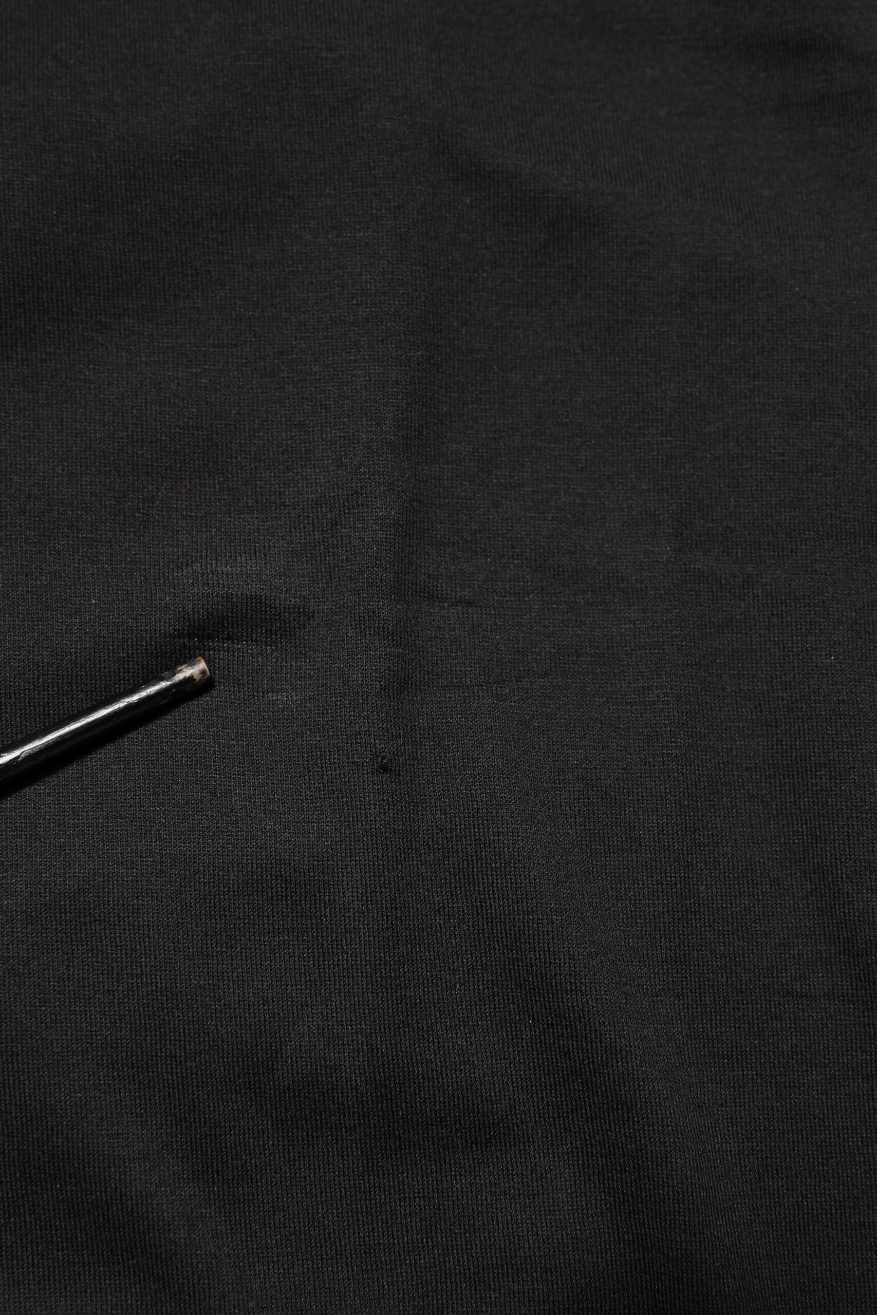Débardeur homme sans manches en coton noir de Dolce & Gabbana, sous-vêtement élégant et confortable.