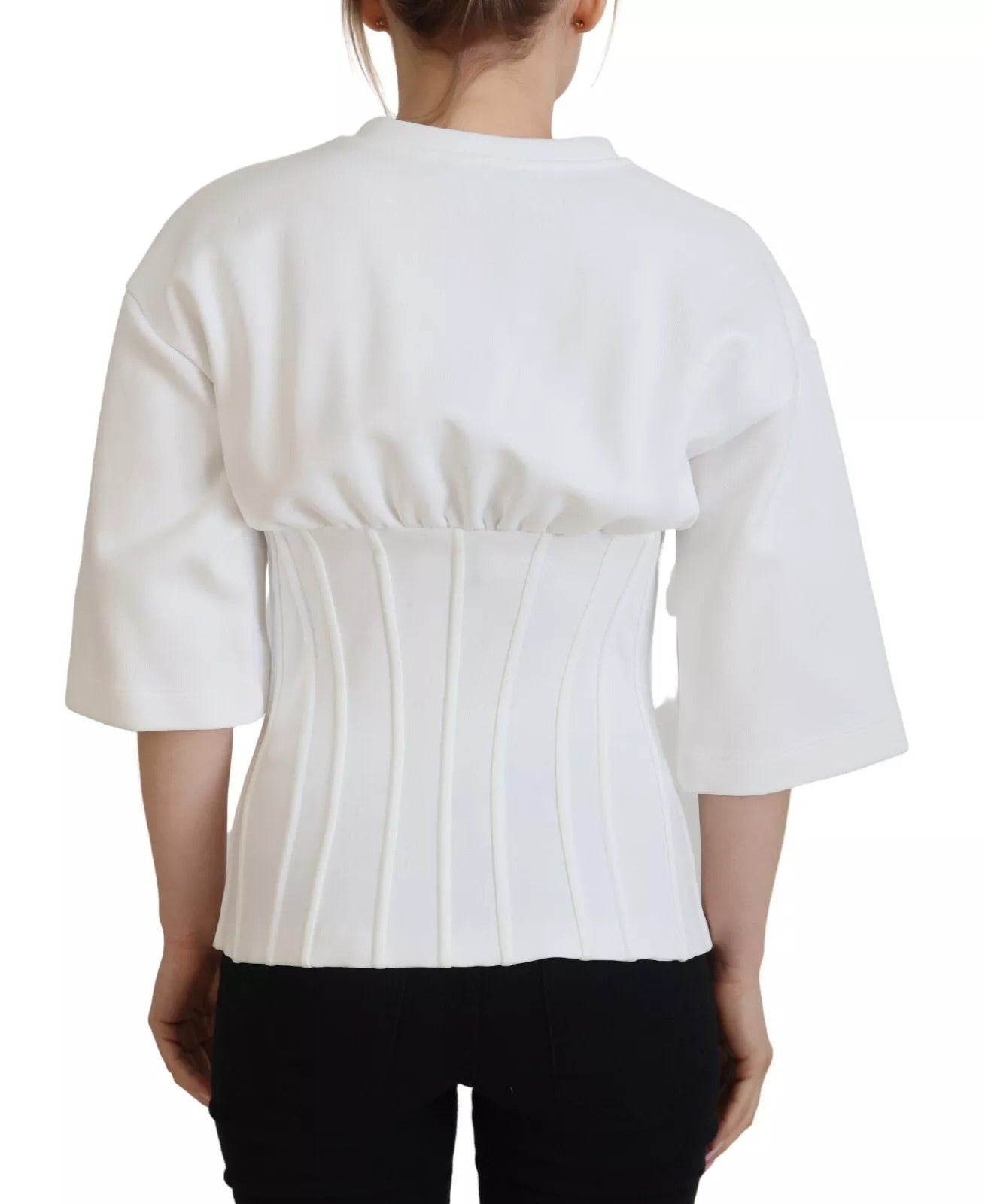 Corset stretch en coton blanc de Dolce & Gabbana, top ajusté et élégant, visible avec détails de couture.