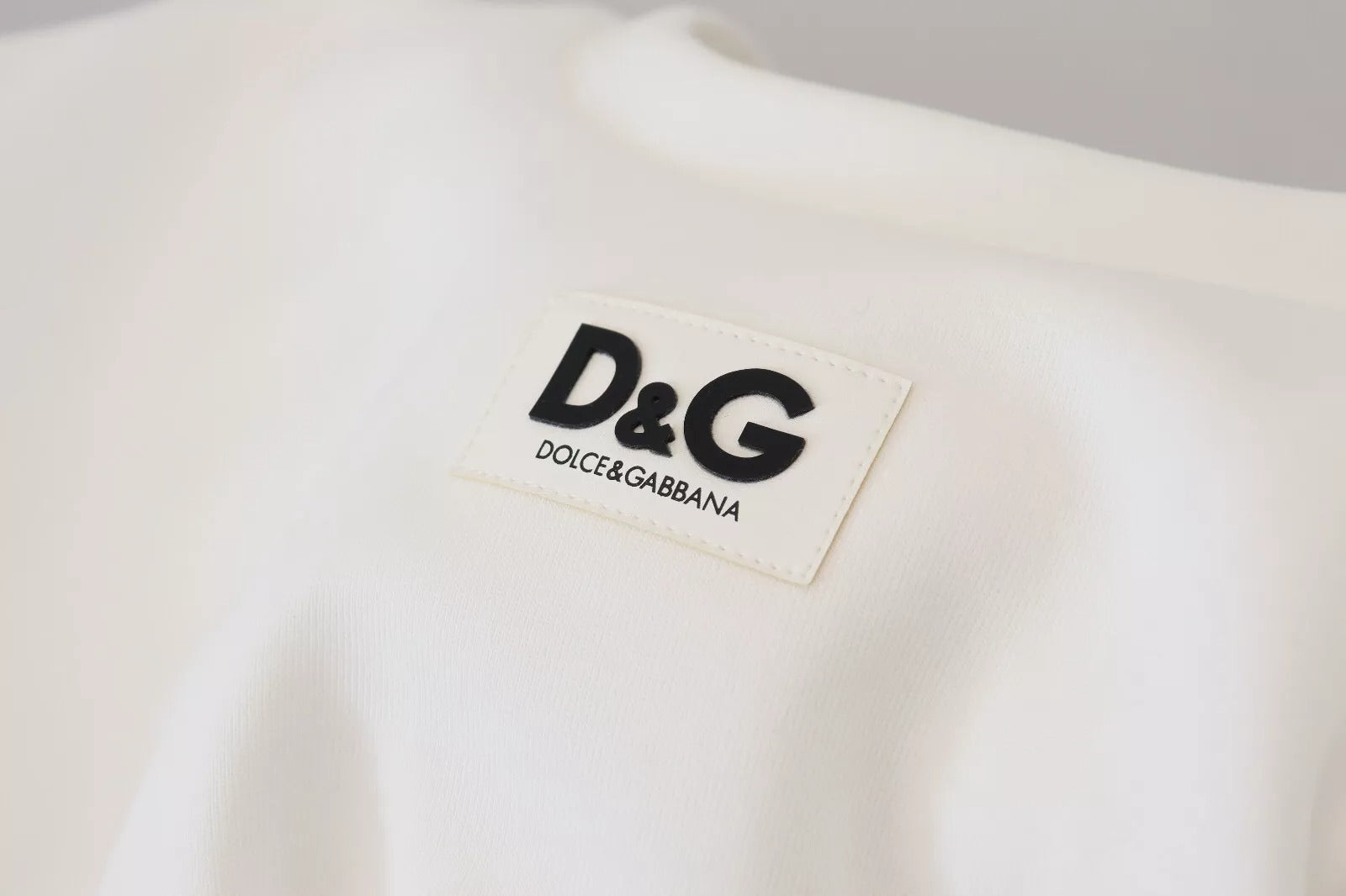 T-shirt corset en coton blanc de Dolce & Gabbana, coupe ajustée et détails élégants, parfait pour un style sophistiqué.