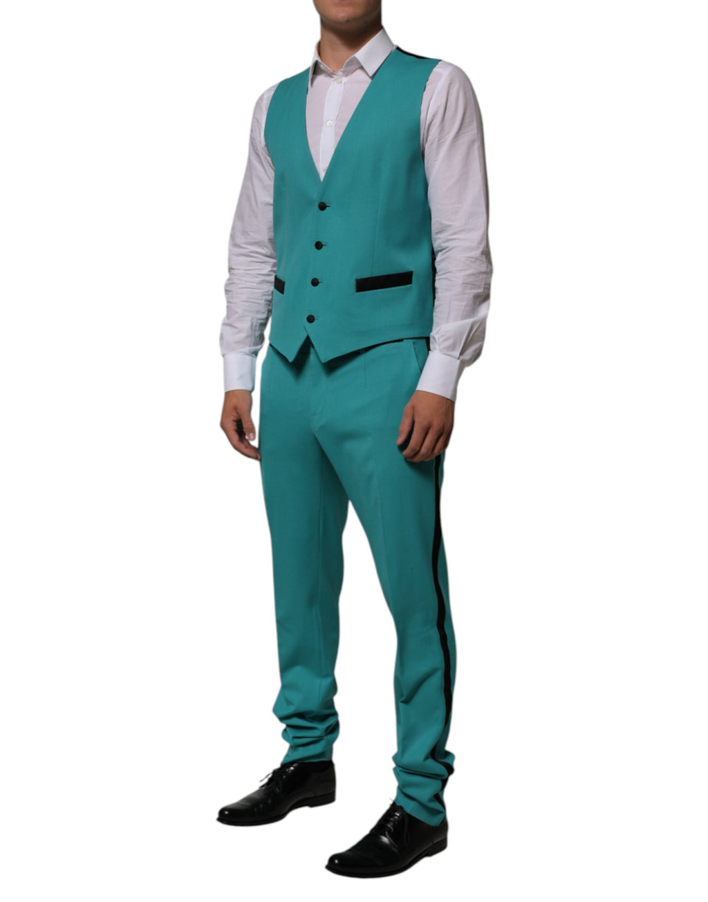 Costume Dolce & Gabbana Cyan en laine et soie en trois pièces, style Sicilia, visible en détail dans l'image.