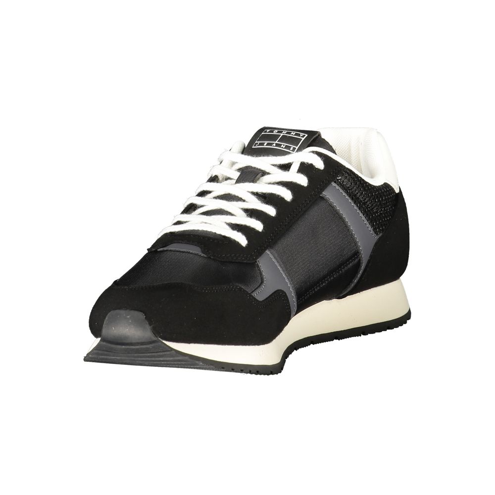 Sneakers Tommy Hilfiger en polyuréthane noir pour hommes, vue en plan avec détails de la semelle et du design moderne.