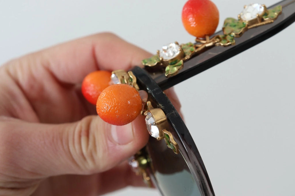 Lunettes de soleil Dolce & Gabbana DG4283B en acétate avec cristaux orange et appliques élégantes.
