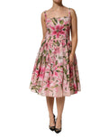 Robe midi sans manches Dolce & Gabbana à imprimé floral rose et lys rose, style élégant et féminin.