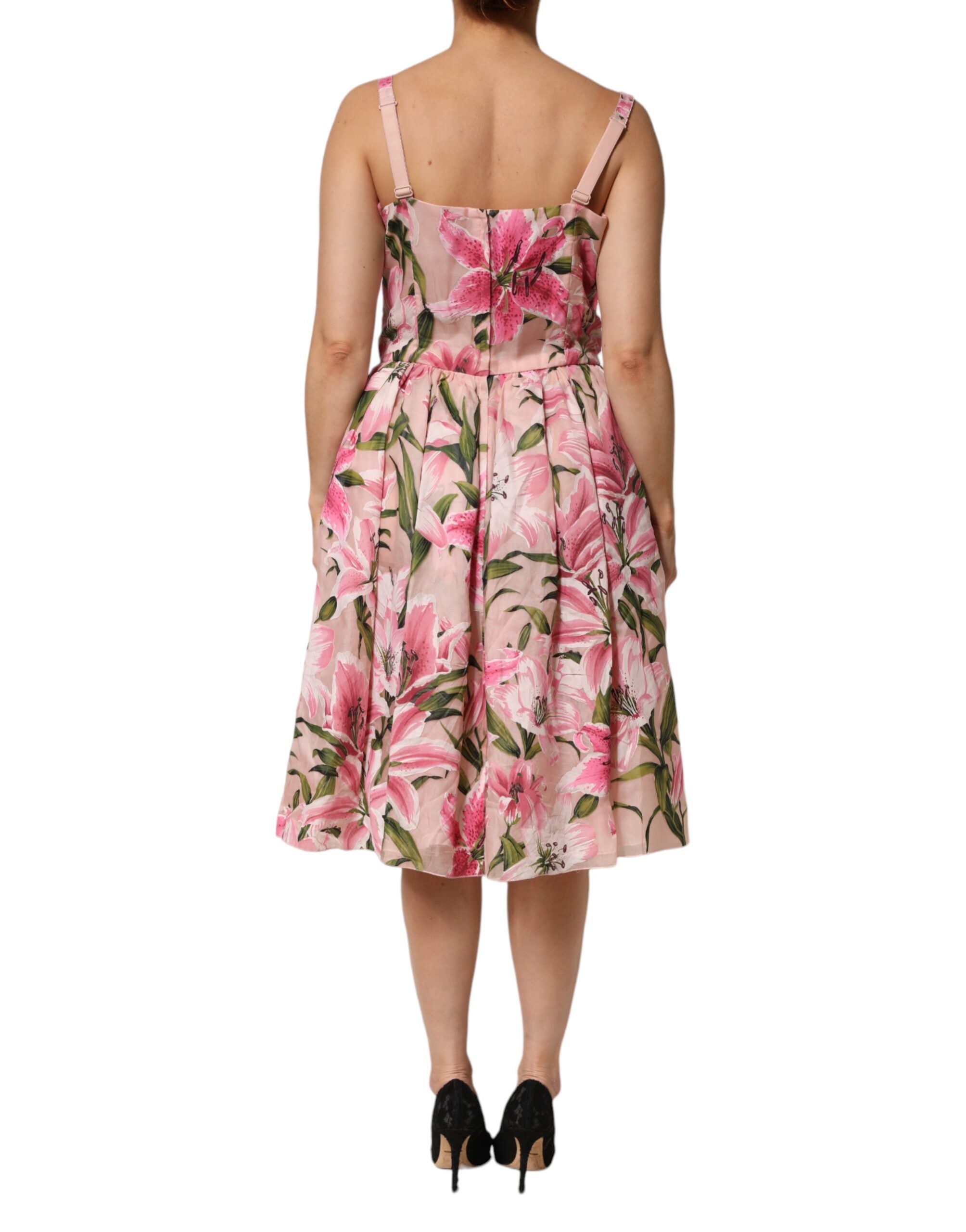Robe midi sans manches Dolce & Gabbana à fleurs roses et lys, motif floral élégant et tissu léger.