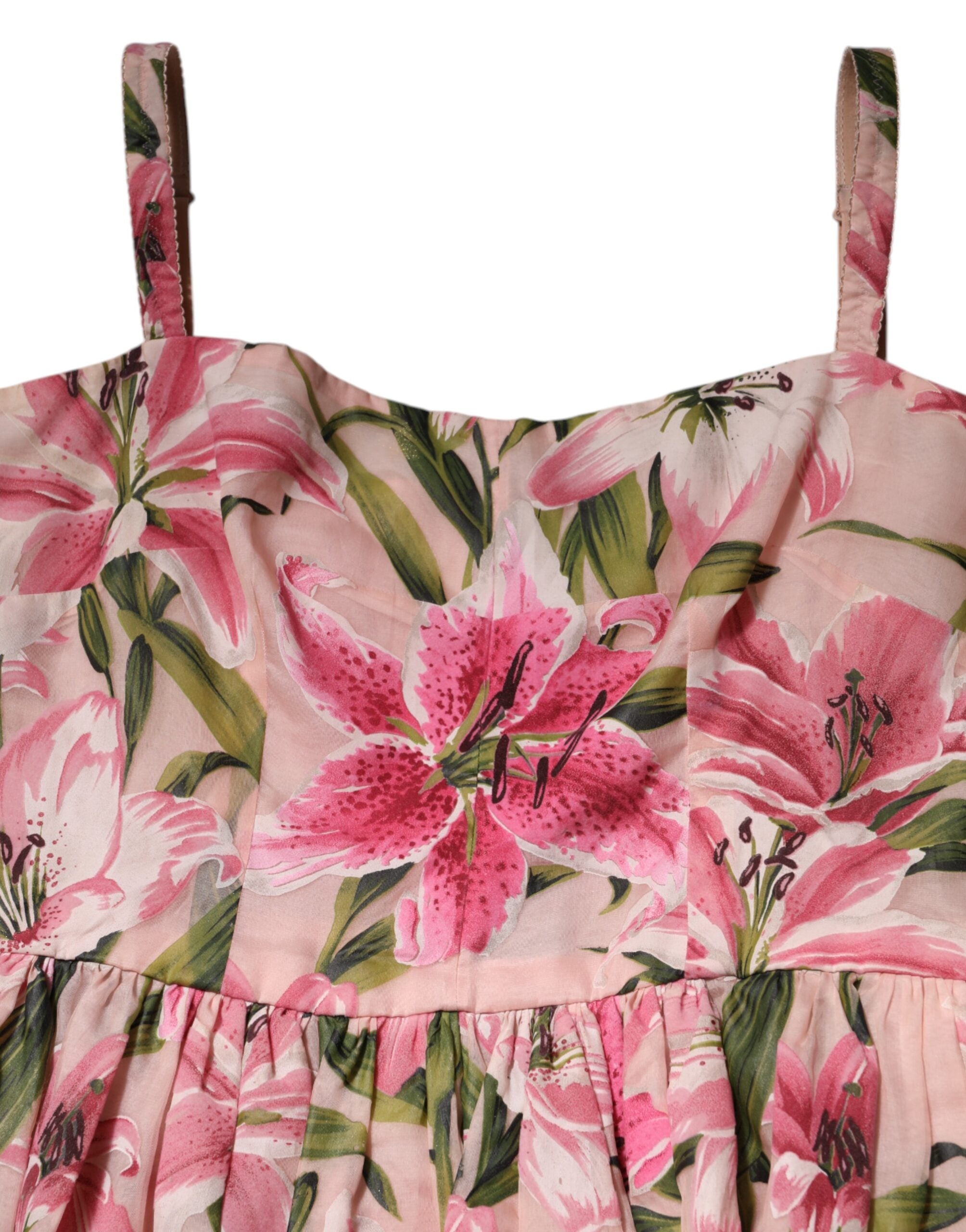 Robe midi sans manches Dolce & Gabbana à imprimé floral rose et lys en rose, élégante et féminine.