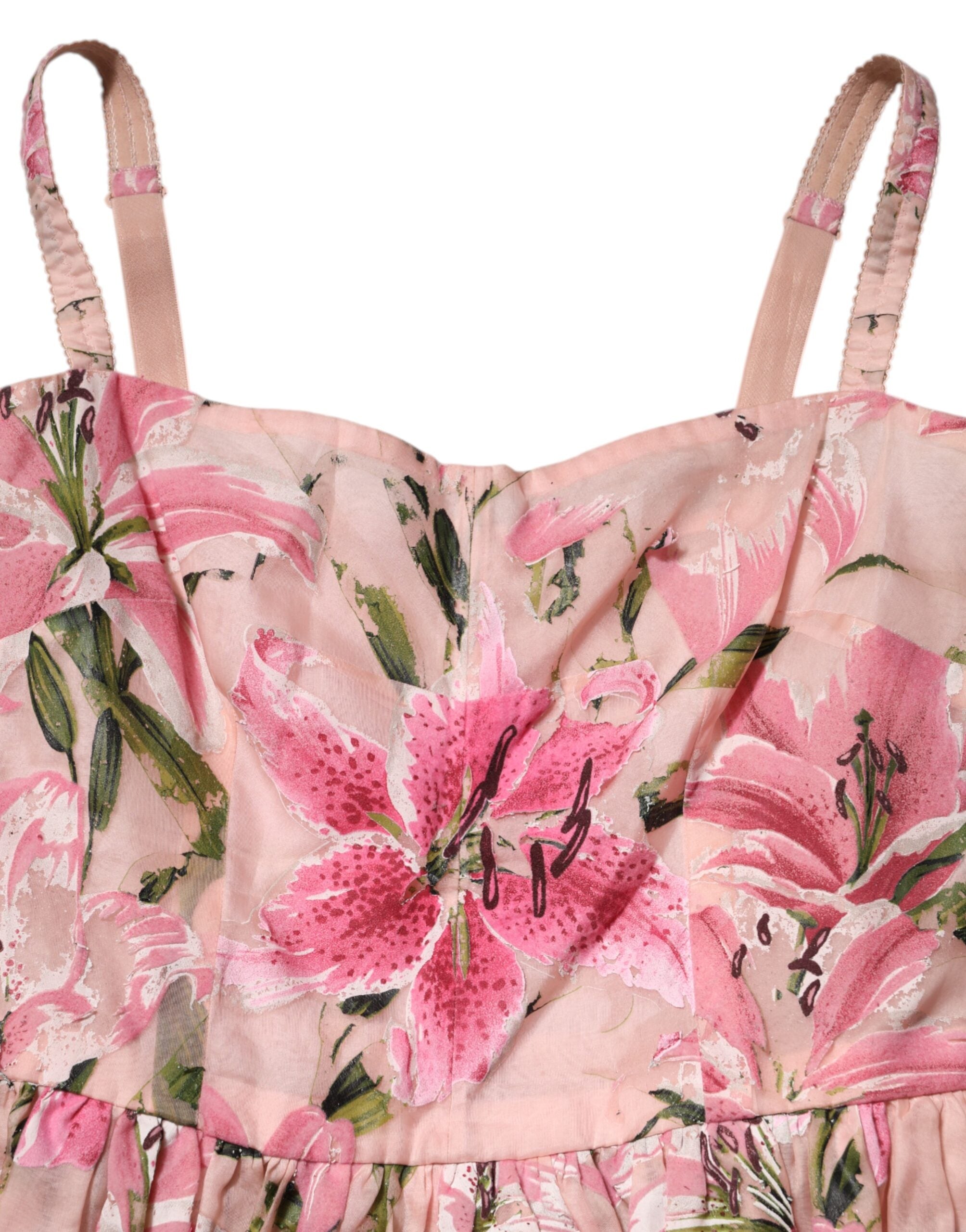 Robe sans manches en coton rose à fleurs et plis de Dolce & Gabbana, élégante et légère, pour un style féminin et raffiné.