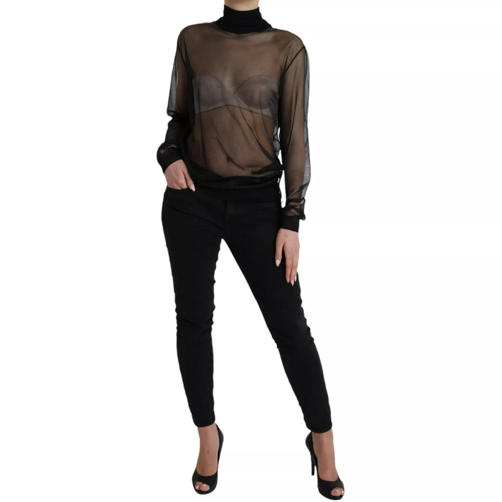 Blouse en dentelle noire à col roulé en mesh transparent de Dolce & Gabbana, haut élégant et sophistiqué.